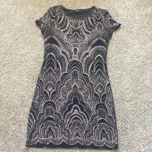 Black dress, rose gold detailing